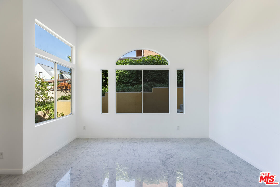 23636 Aster Trail Calabasas, CA 91302 - Photo 6 of 67 an empty room with windows