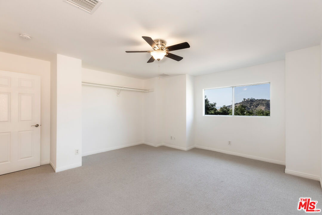 23636 Aster Trail Calabasas, CA 91302 - Photo 66 of 67 a view of an empty room with a window