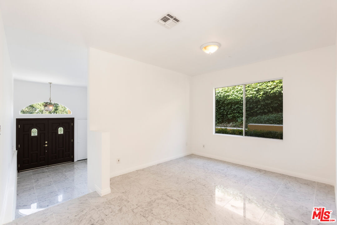 23636 Aster Trail Calabasas, CA 91302 - Photo 9 of 67 a view of an empty room with a window