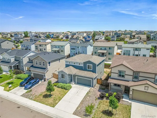 a view of yard with seating area and mountain view in back