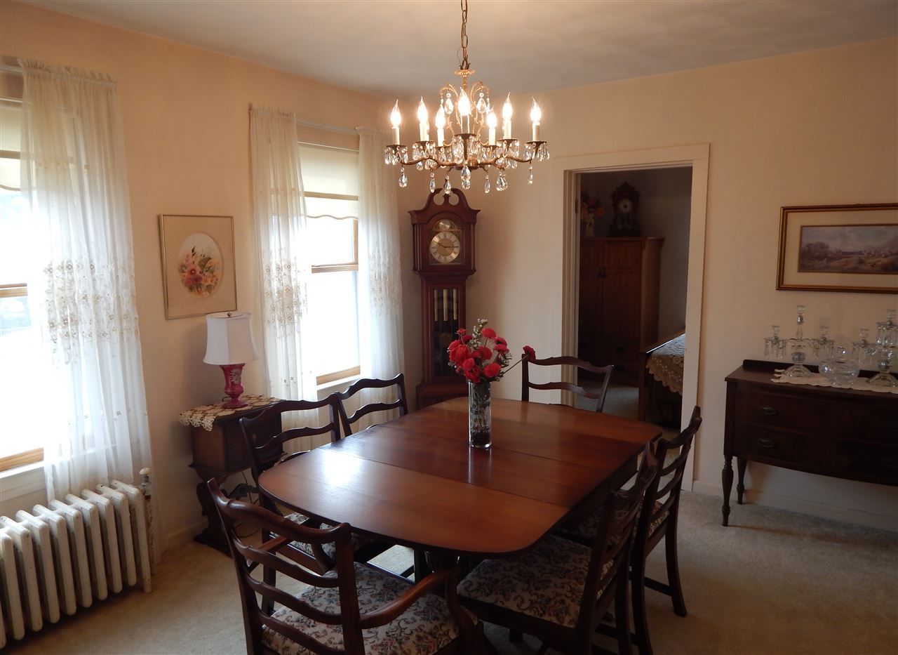1493 Ipsen Road Belvidere, IL 61008 - Photo 13 of 30 a dining room with furniture and window