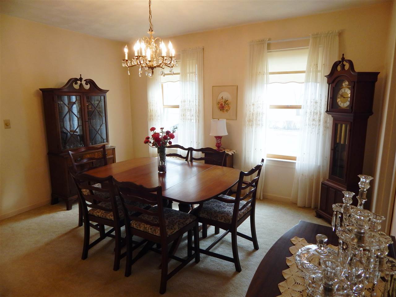 1493 Ipsen Road Belvidere, IL 61008 - Photo 15 of 30 a view of a dining room with furniture and chandelier