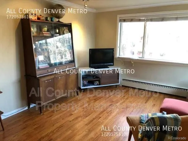 a view of a livingroom with furniture