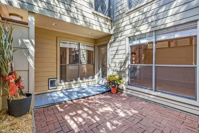 a view of a porch with a bench