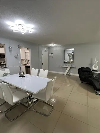 a view of dining room cabinets and window