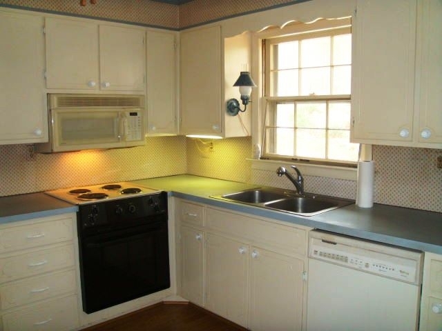 8095 Edwardsville Road Hardy, VA 24101 - Photo 8 of 25 a kitchen with granite countertop a sink and a stove