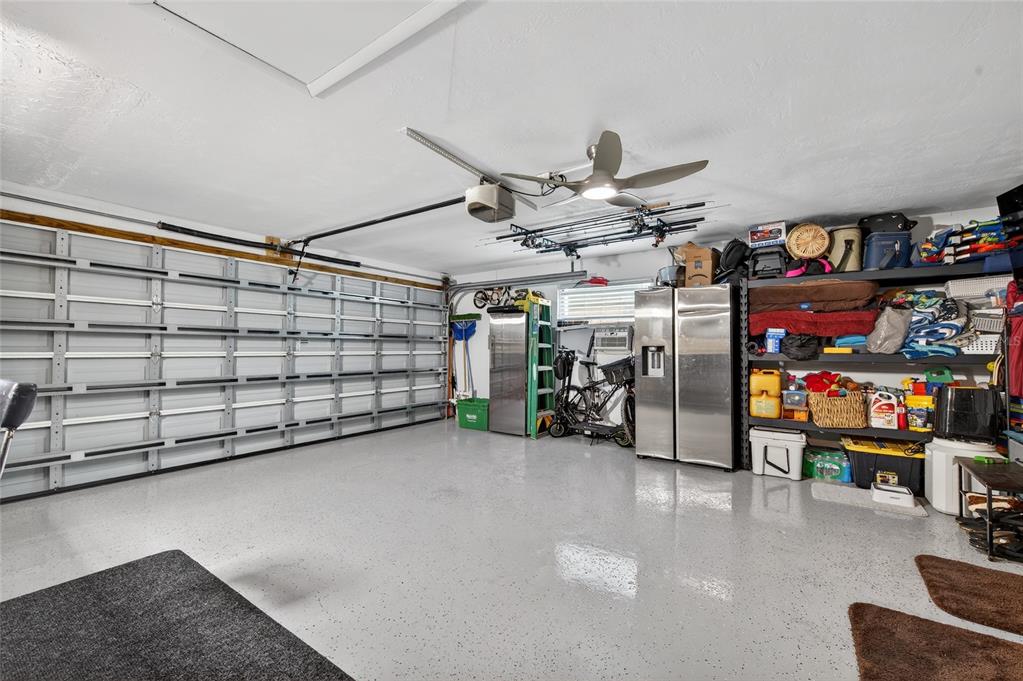 92 Alberta Avenue Ponce Inlet, FL 32127 - Photo 24 of 31 a view of a garage with storage