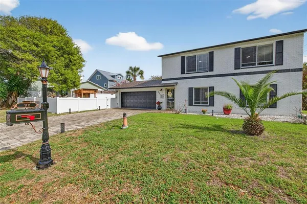 a house view with a garden space