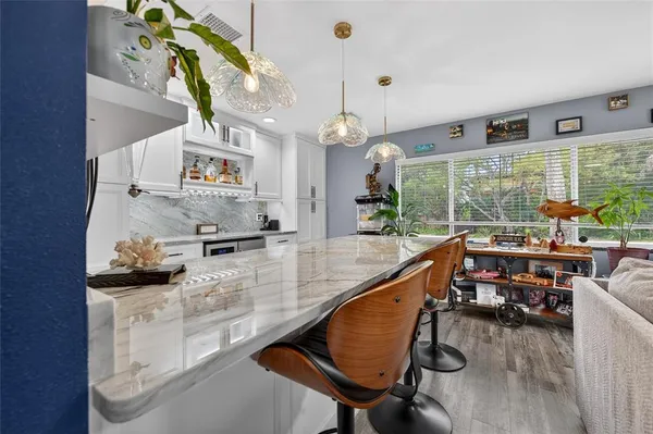 a kitchen with granite countertop lots of counter top space