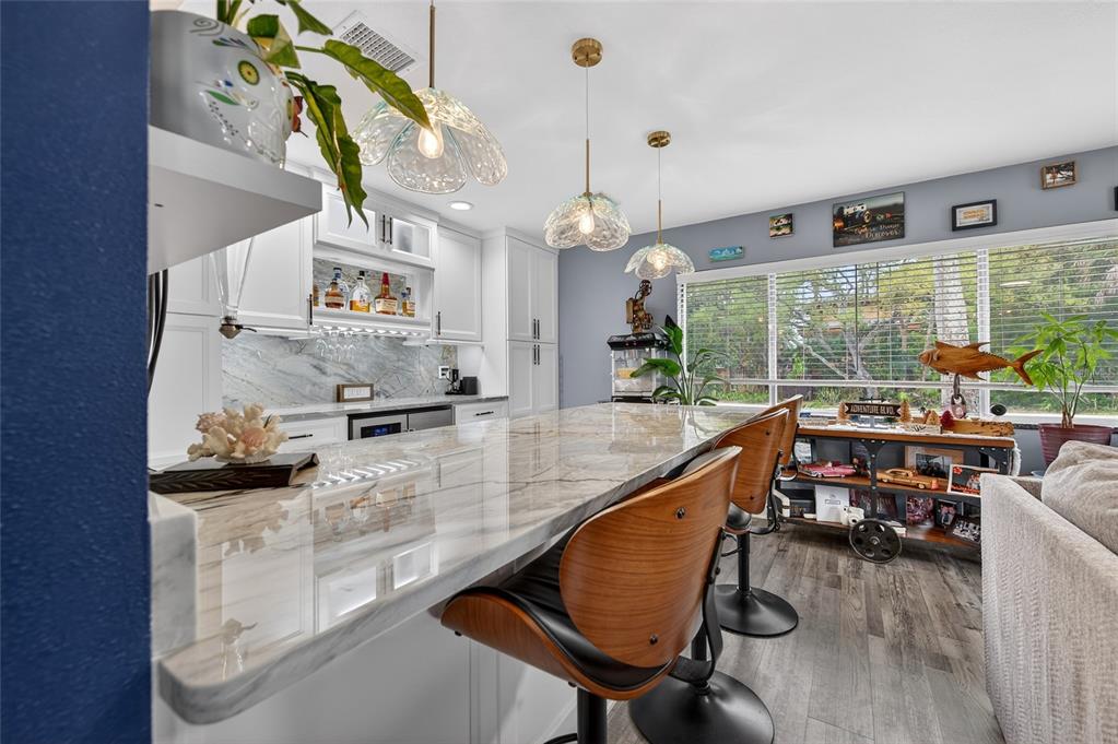 92 Alberta Avenue Ponce Inlet, FL 32127 - Photo 6 of 31 a kitchen with granite countertop lots of counter top space