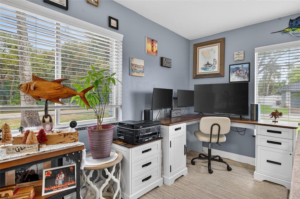 92 Alberta Avenue Ponce Inlet, FL 32127 - Photo 9 of 31 a work room with furniture and a window