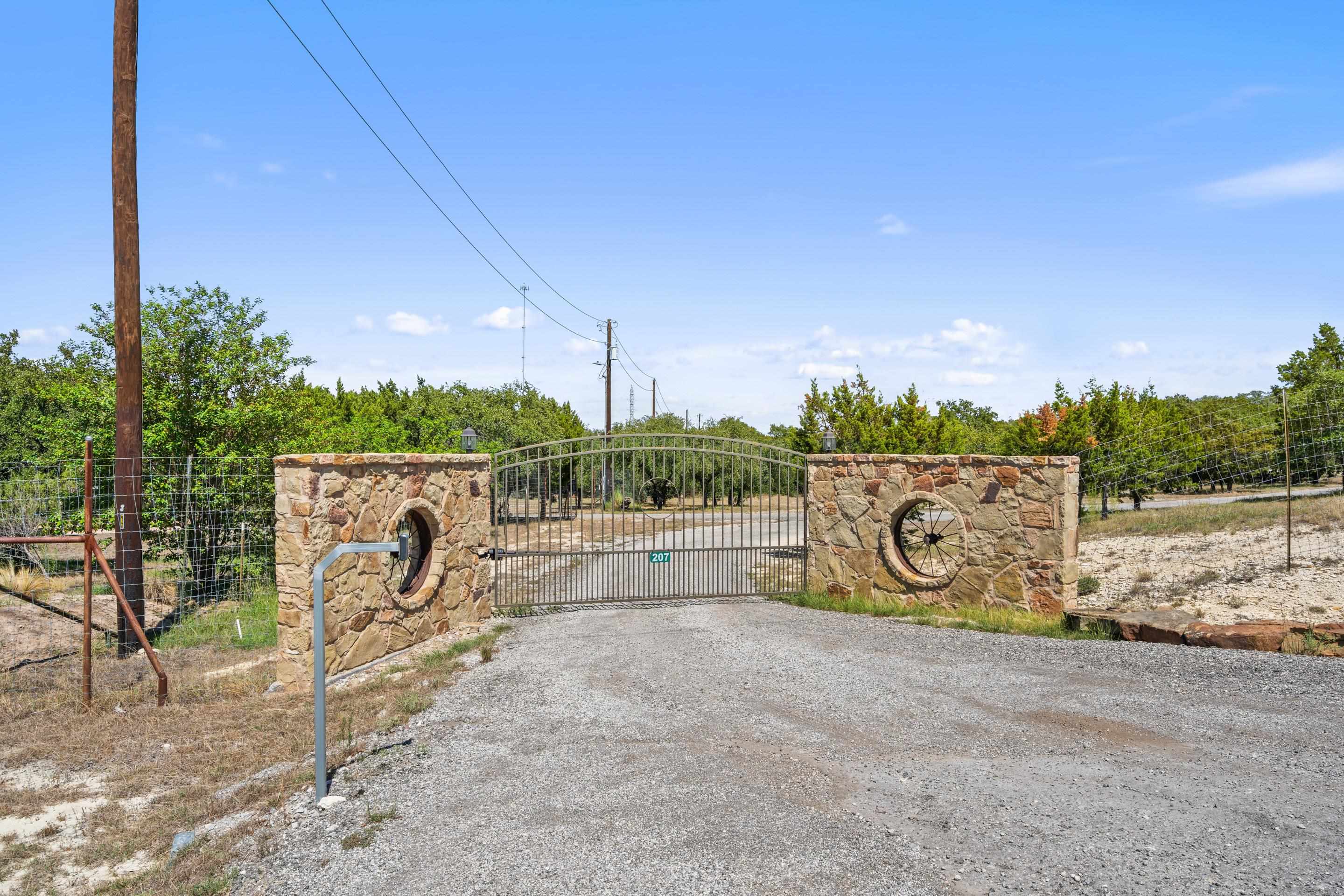 175 Scenic Ridge Drive Spicewood, TX 78669 - Photo 18 of 30 a sign board with a play ground