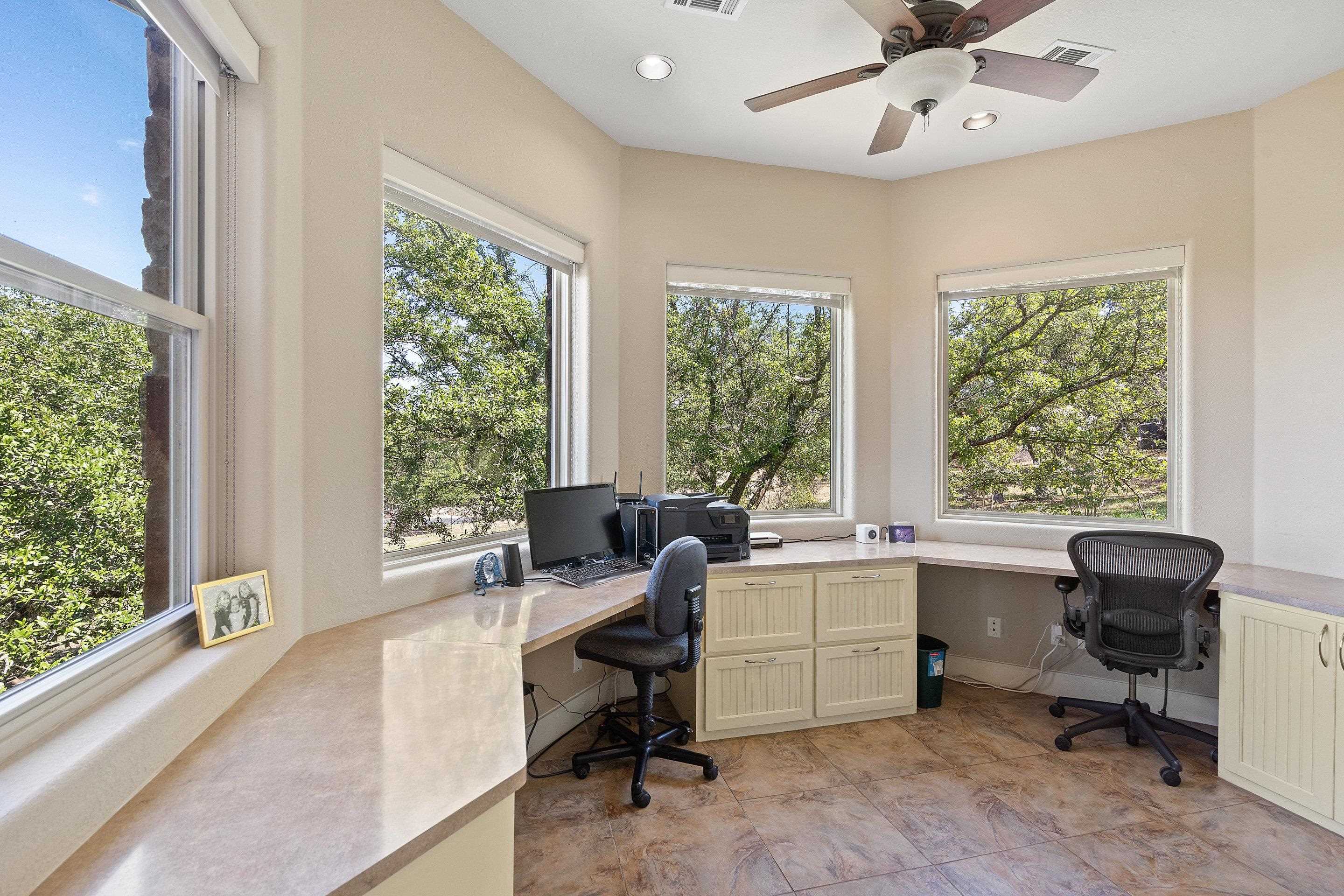 175 Scenic Ridge Drive Spicewood, TX 78669 - Photo 25 of 30 a view of a workspace with a window