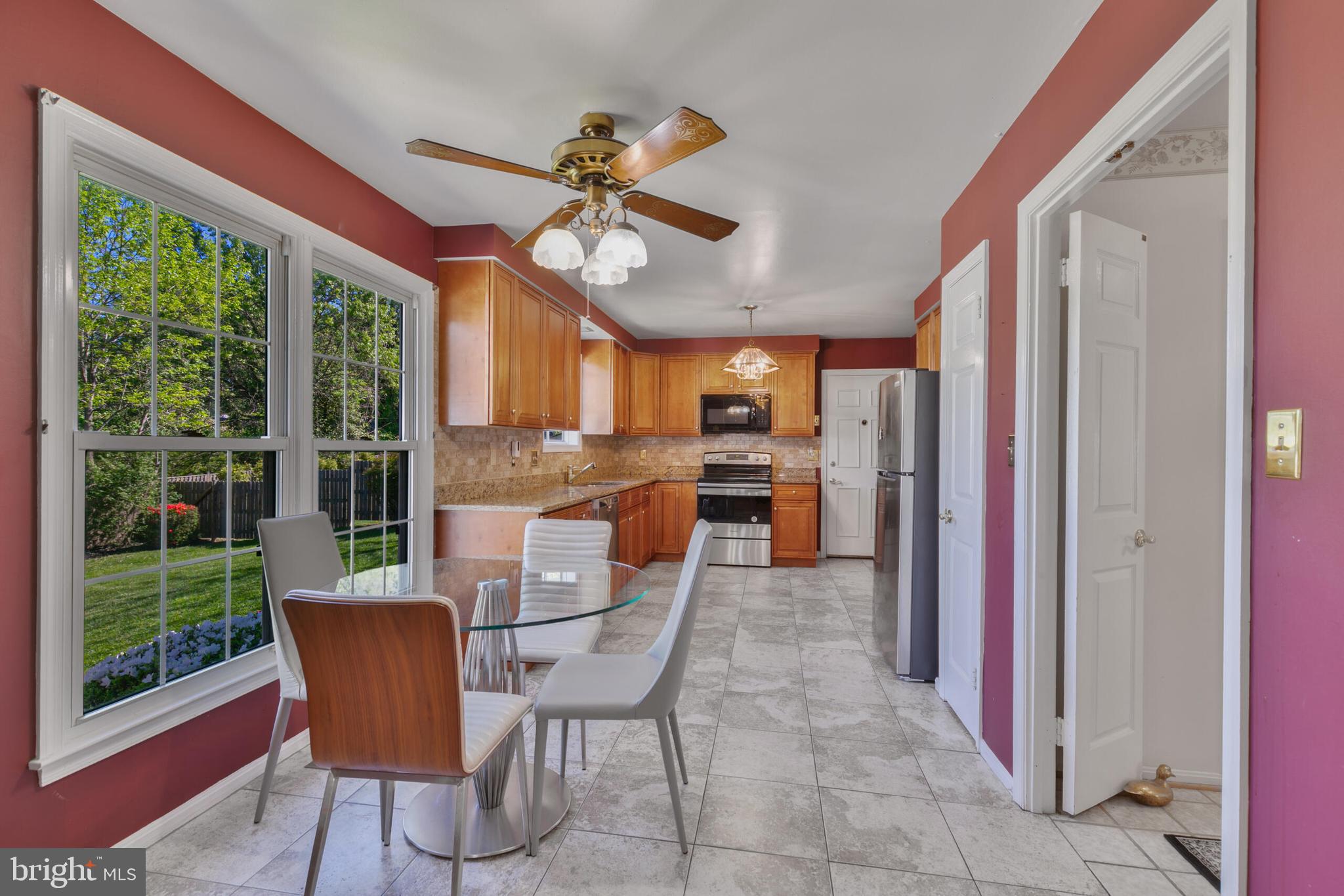 13208 Rippling Brook Drive Silver Spring, MD 20906 - Photo 16 of 56 Eat in kitchen and bright wall of windows