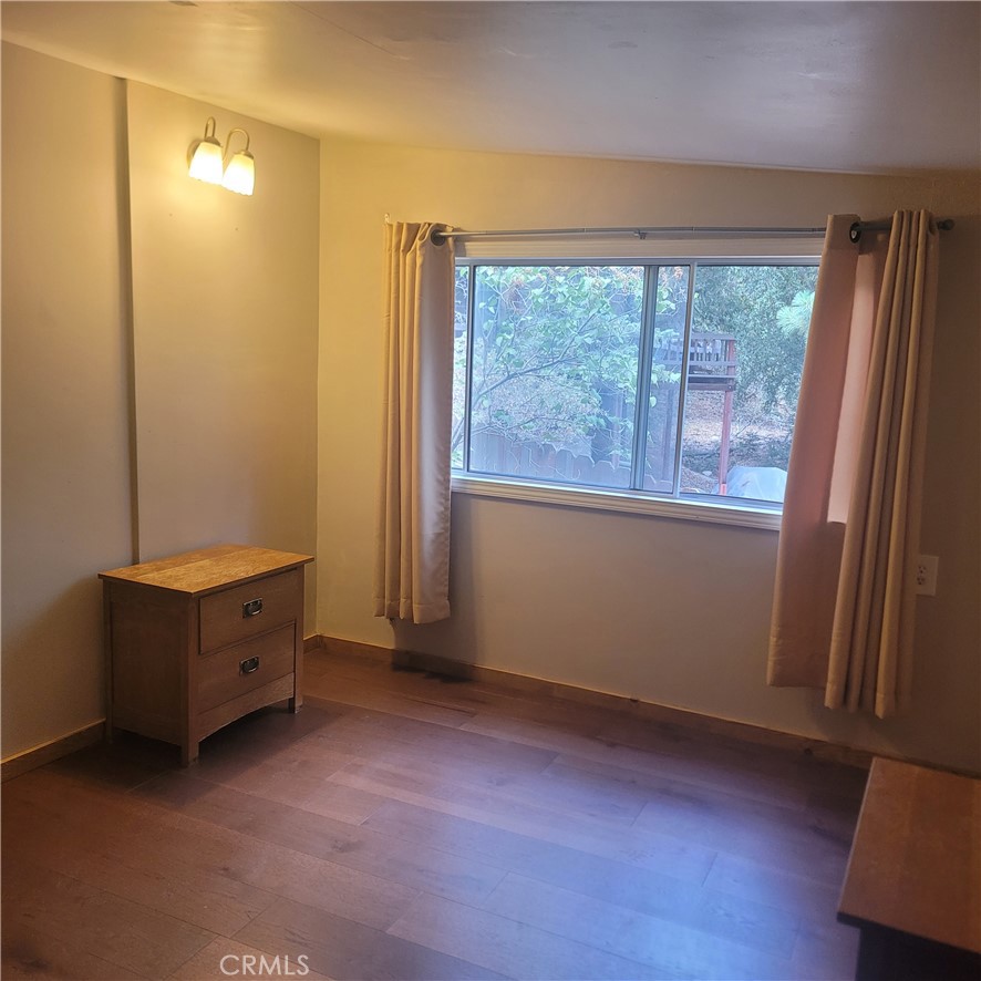 23340 Banning Idyllwild Idyllwild, CA 92549 - Photo 11 of 23 an empty room with a window