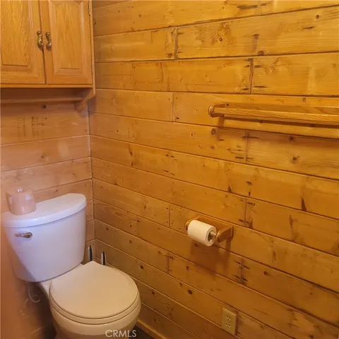 a bathroom with a toilet and a sink