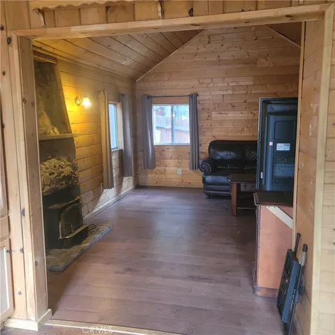 a view of livingroom with furniture and fireplace