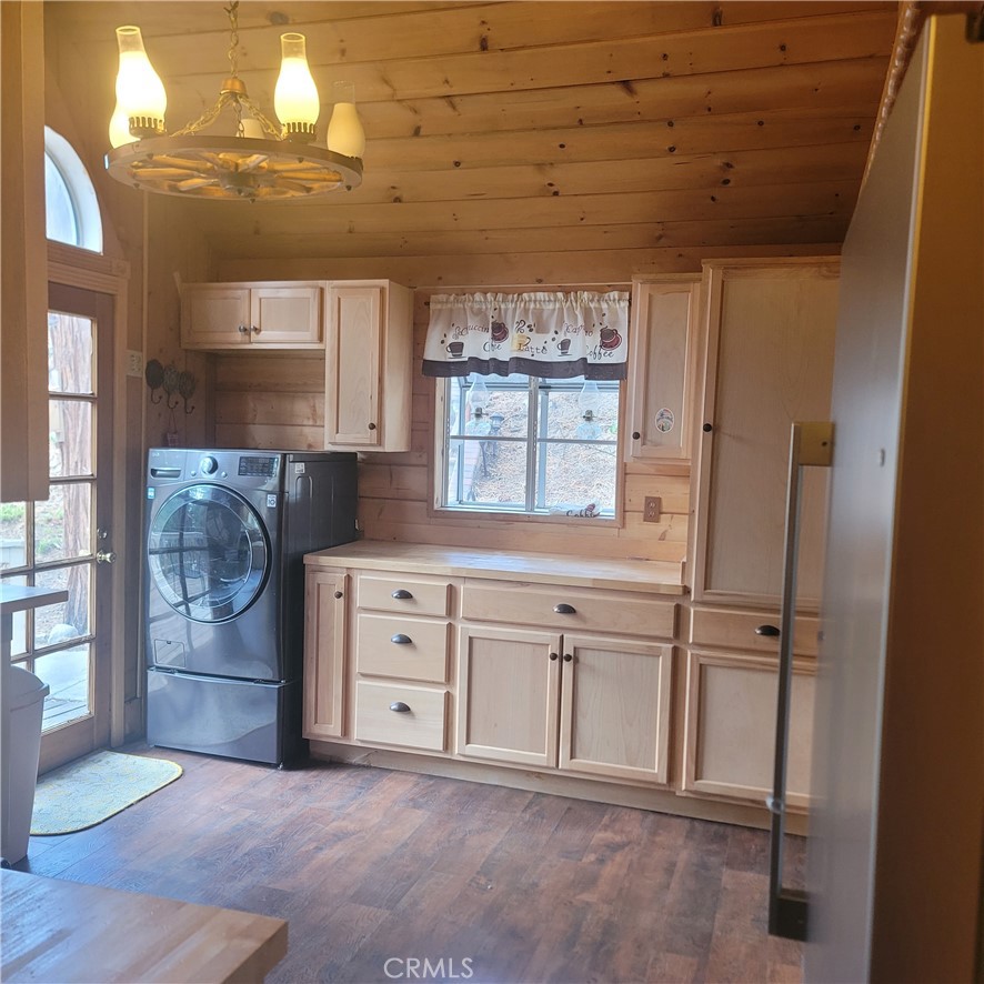 23340 Banning Idyllwild Idyllwild, CA 92549 - Photo 6 of 23 a kitchen with cabinets and window