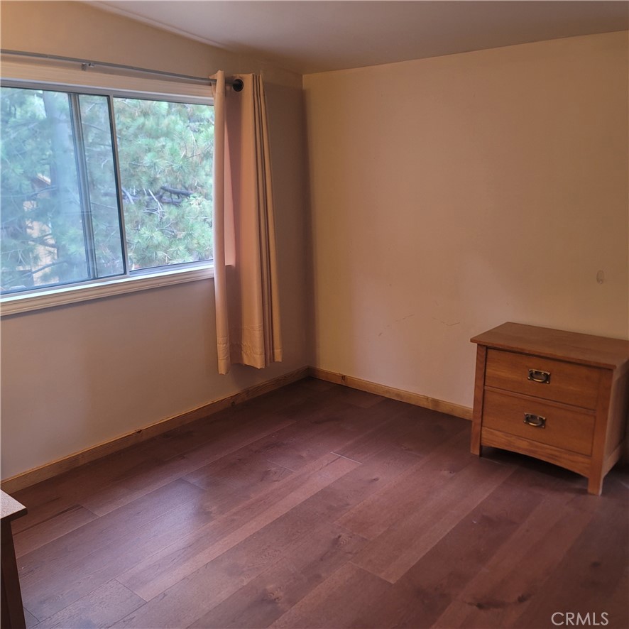 23340 Banning Idyllwild Idyllwild, CA 92549 - Photo 10 of 23 an empty room with a window