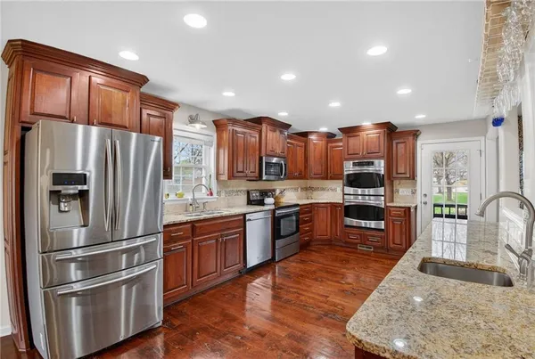 $475,000 | 5660 Meadow Height Drive, Shawnee, KS 66226