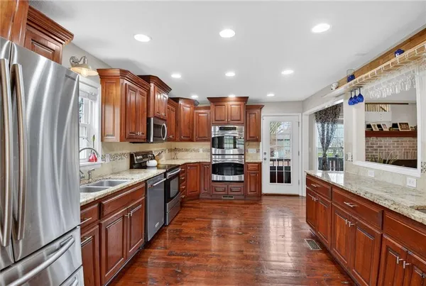 $475,000 | 5660 Meadow Height Drive, Shawnee, KS 66226