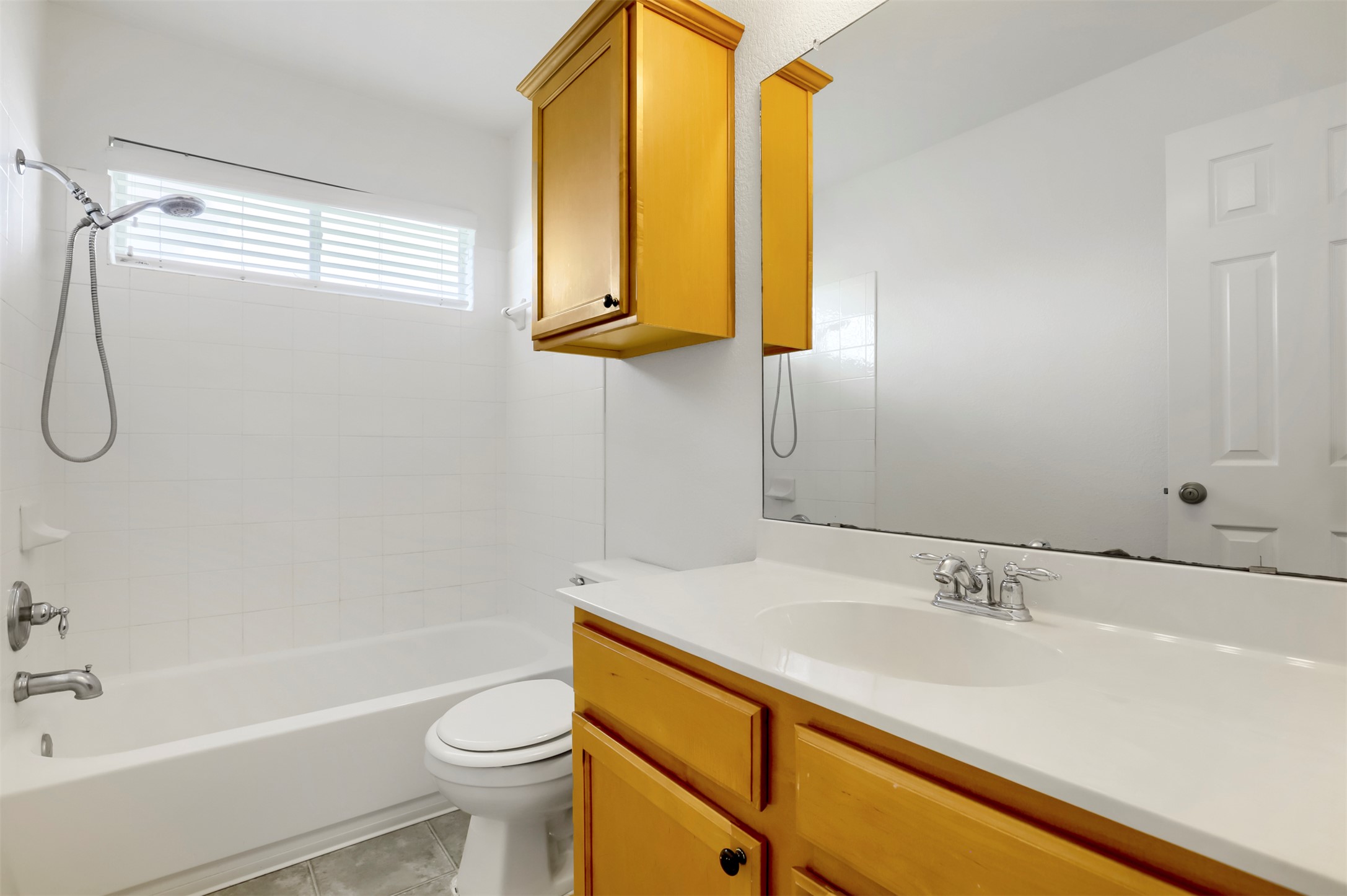 4125 Pebble Ridge Cove Round Rock, TX 78681 - Photo 24 of 30 A well-lit full bath, complete with a clean vanity and ample mirror space, awaits for daily routines.