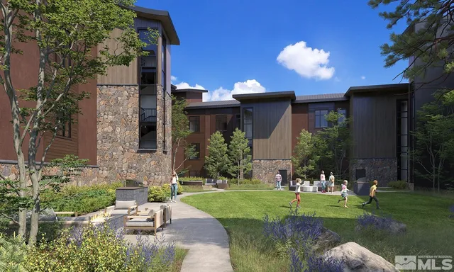 a view of a house with a yard and a fountain