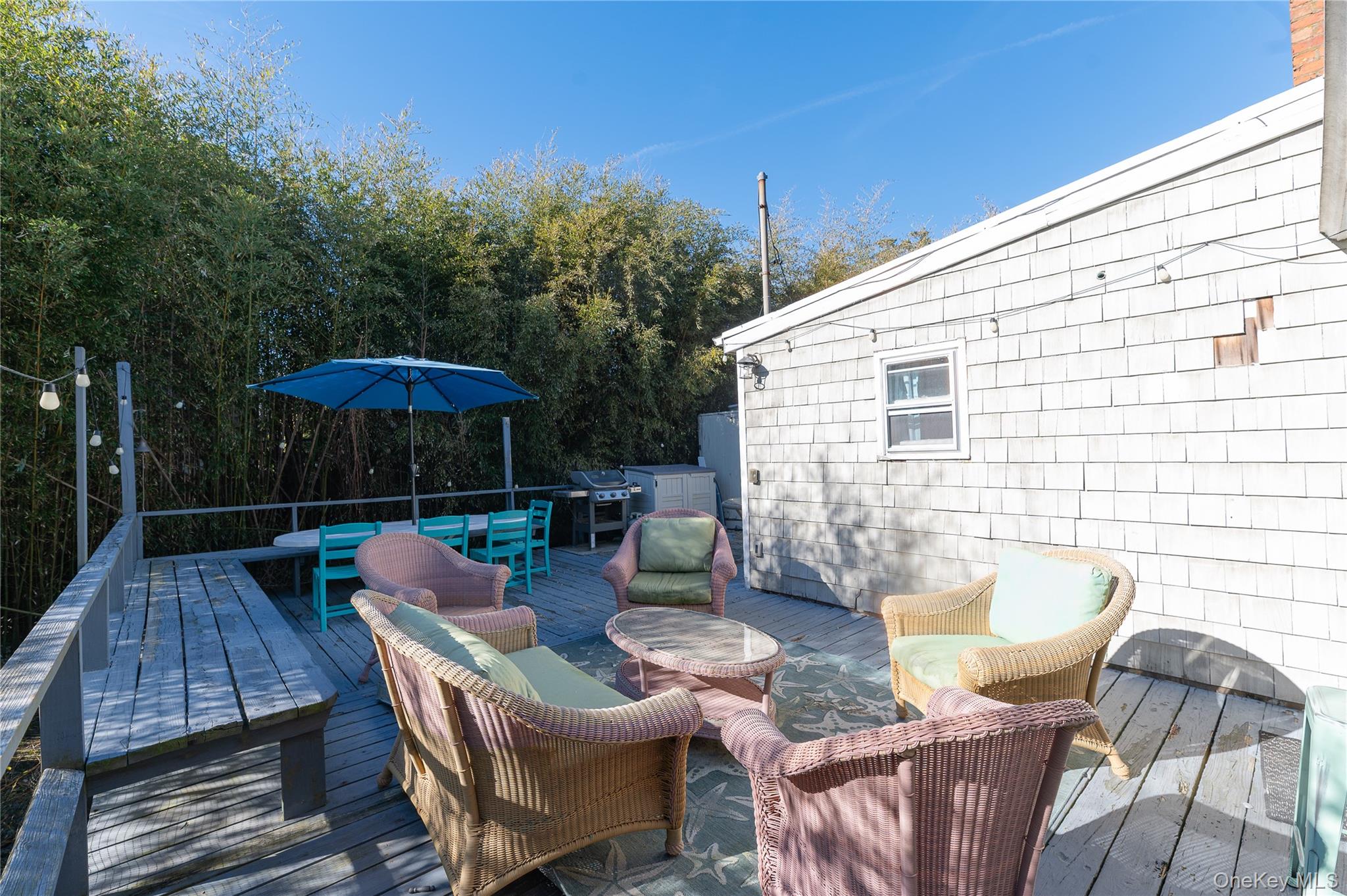 987 Surfview Walk Ocean Beach, NY 11770 - Photo 21 of 22 a view of a patio with furniture