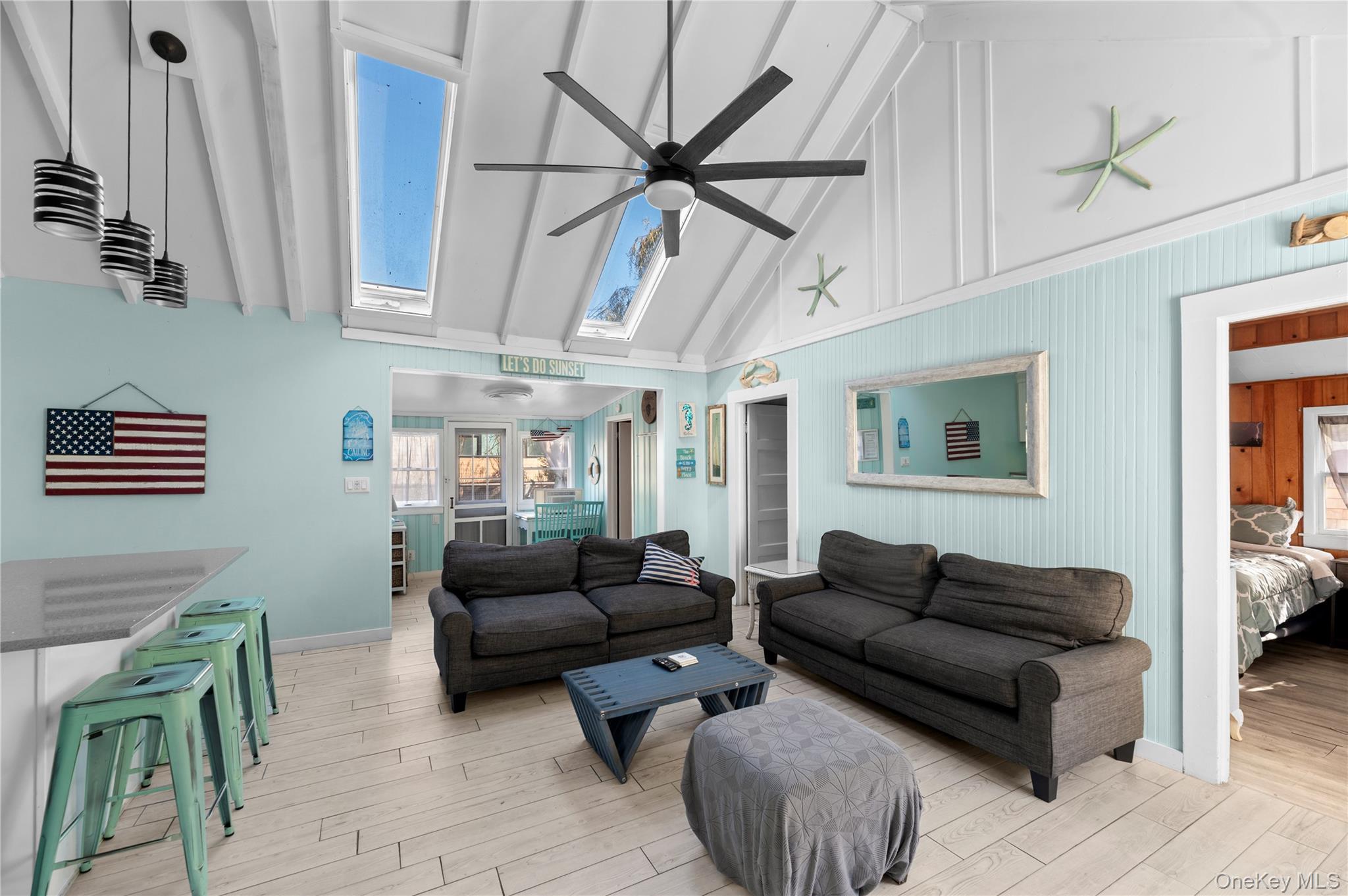 987 Surfview Walk Ocean Beach, NY 11770 - Photo 7 of 22 a living room with furniture