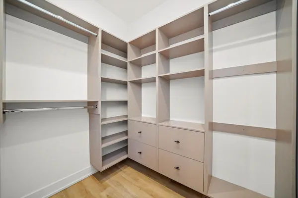 a view of an empty walk in closet