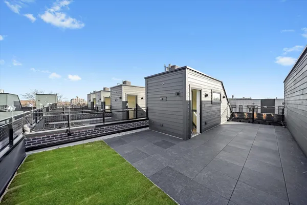 a view of a terrace with a yard