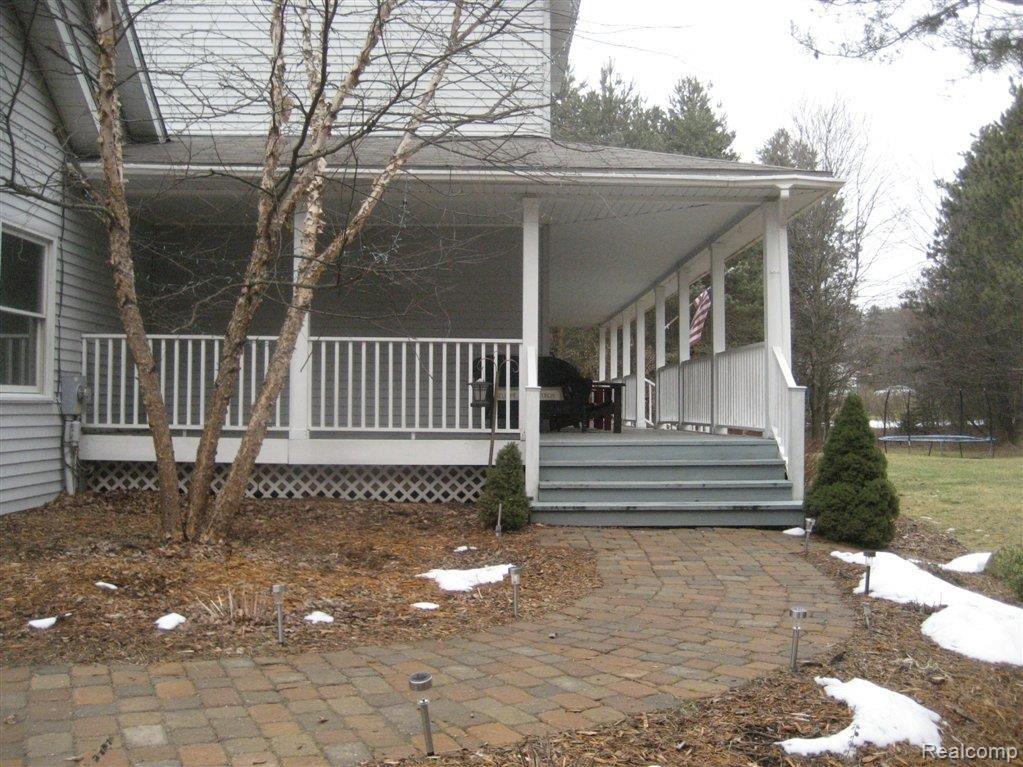 3013 Brewer Road Howell, MI 48855 - Photo 2 of 21 Sitting Porch.jpg