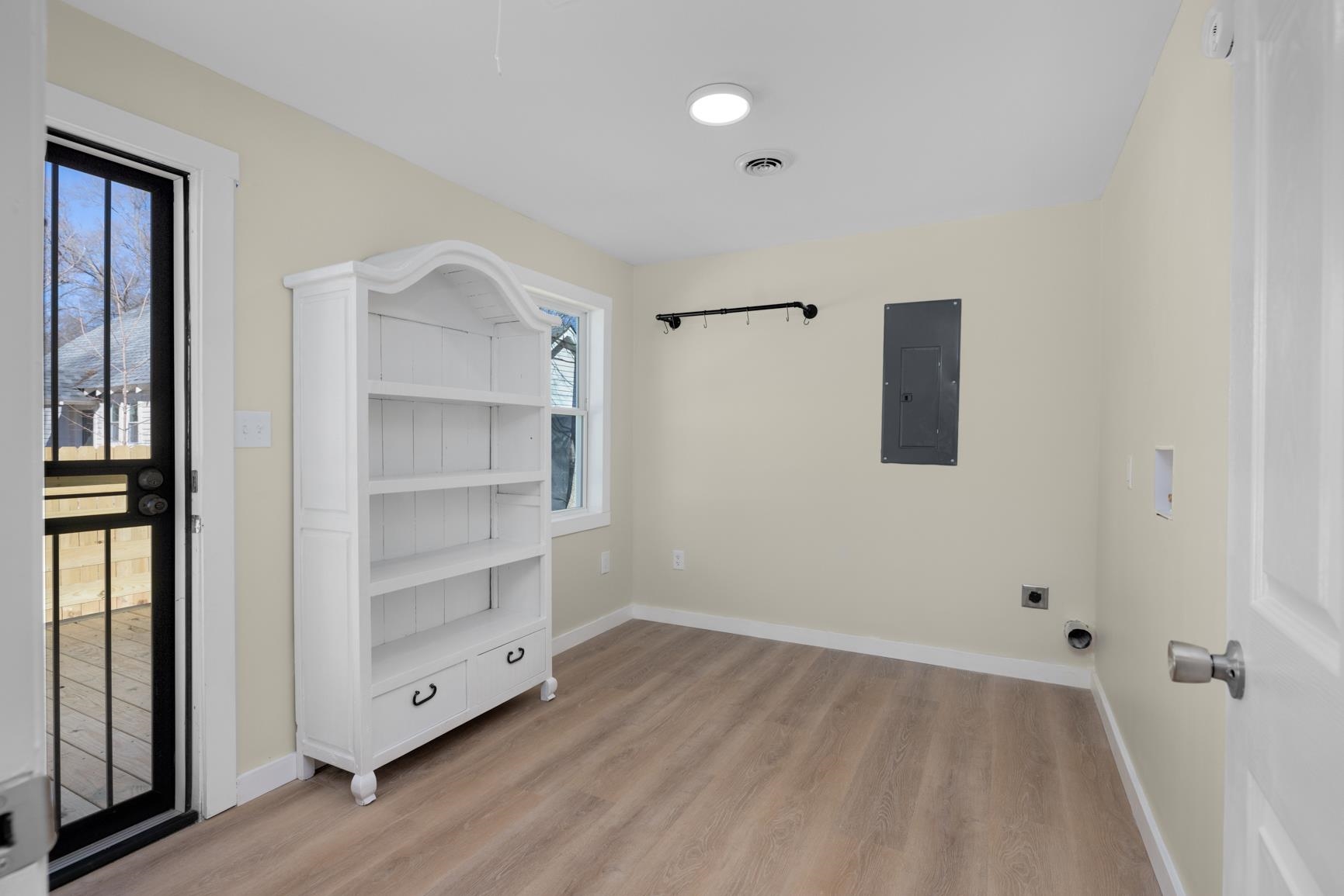 114 Boyce Avenue Covington, TN 38019 - Photo 12 of 24 a view of an empty room with a closet