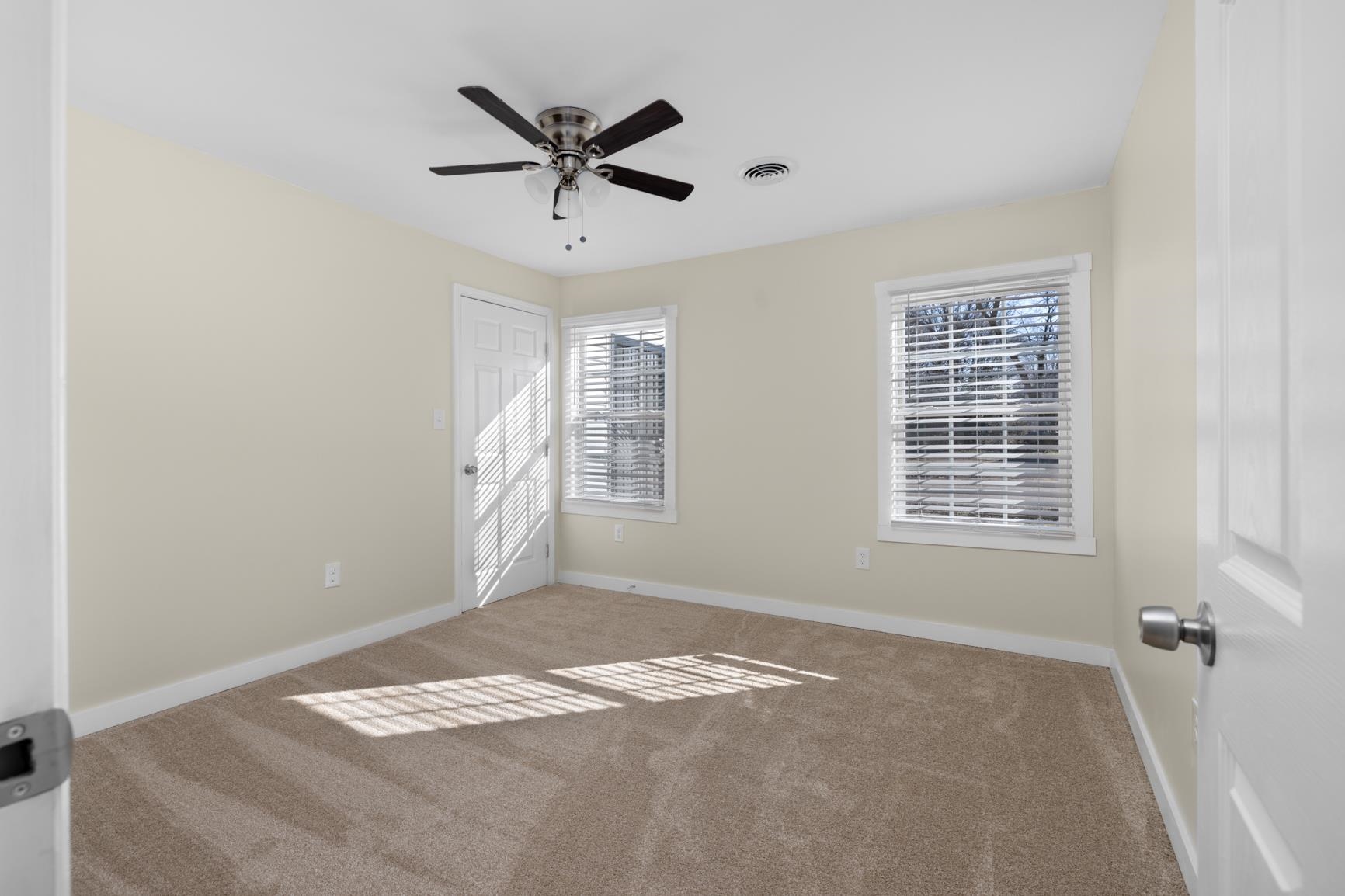 114 Boyce Avenue Covington, TN 38019 - Photo 13 of 24 a view of a livingroom with a ceiling fan and window