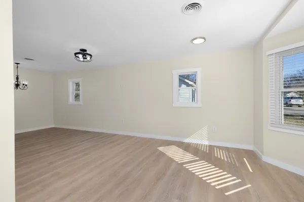 an empty room with windows