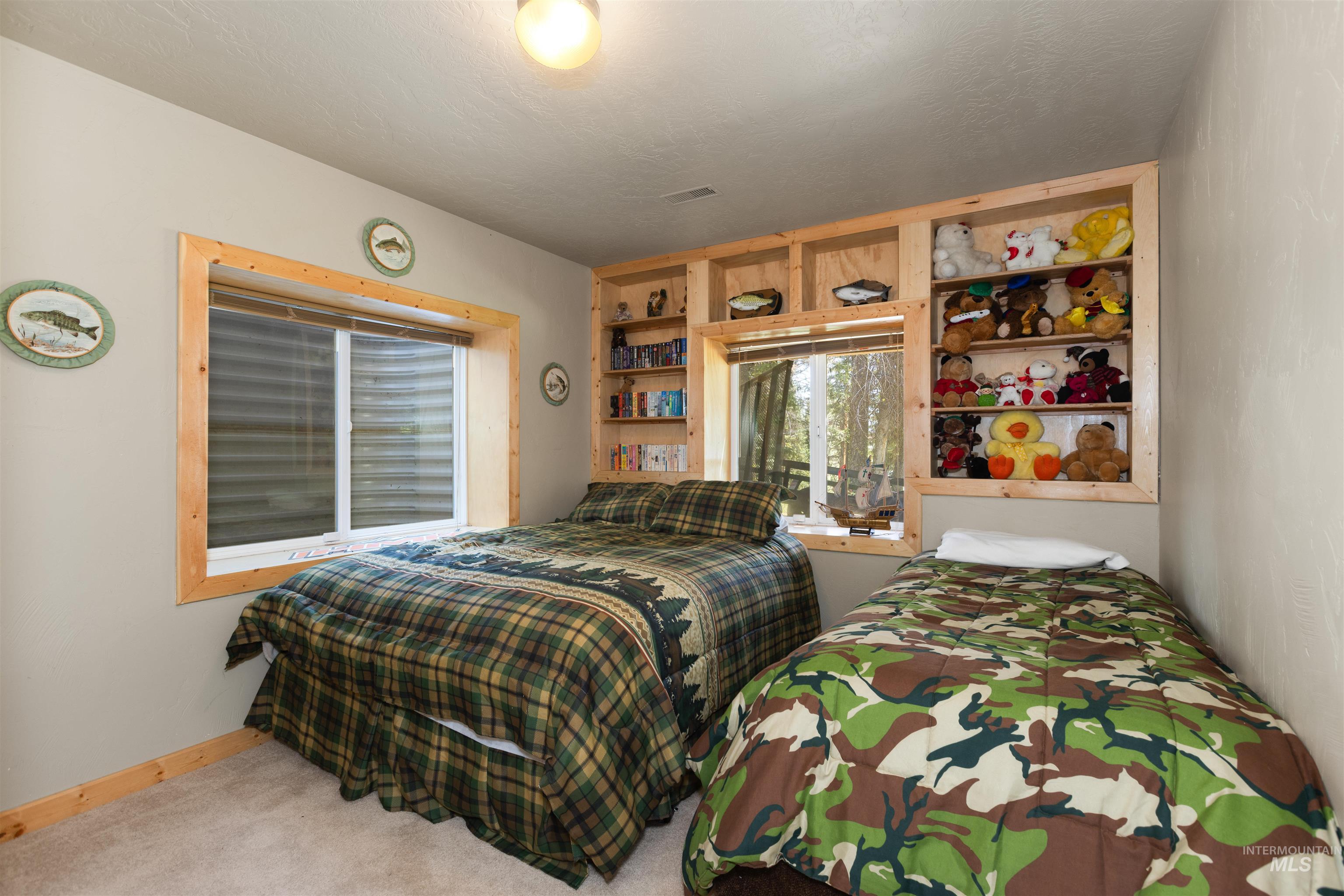 1 Miller Lane Cascade, ID 83611 - Photo 24 of 39 Carpeted bedroom featuring baseboards