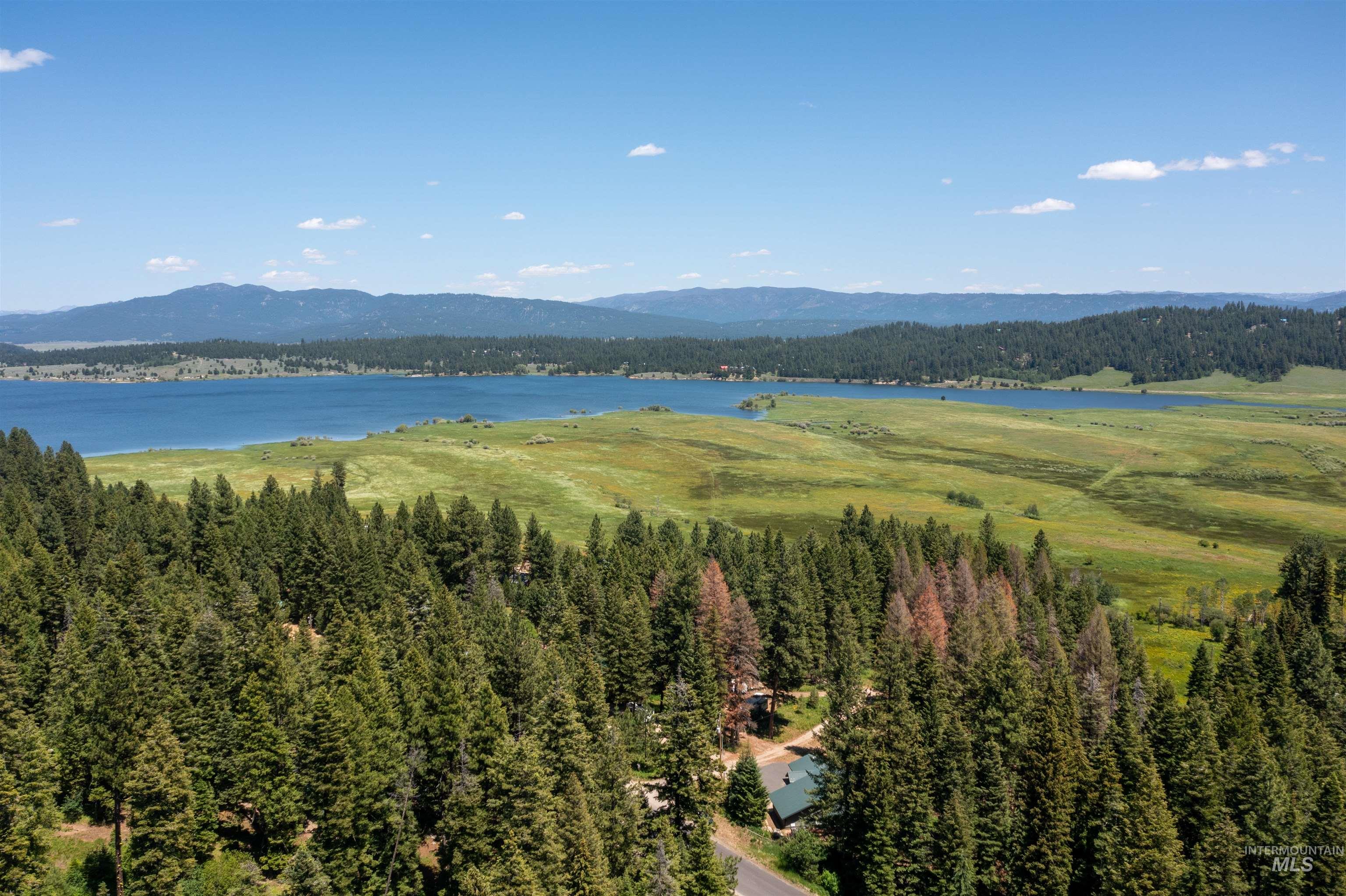 1 Miller Lane Cascade, ID 83611 - Photo 35 of 39 Drone / aerial view of a heavily wooded area and a water and mountain view