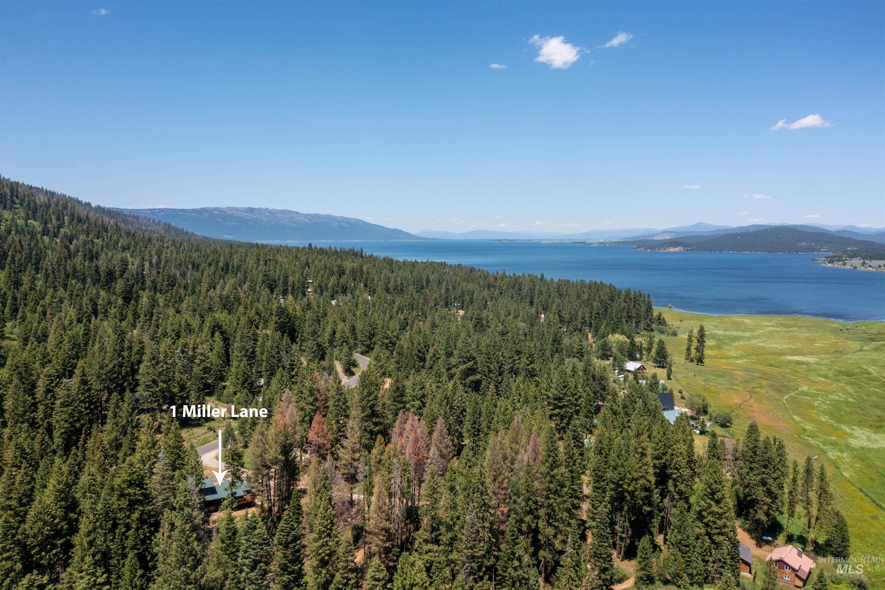 1 Miller Lane Cascade, ID 83611 - Photo 36 of 39 Aerial view of a heavily wooded area and a water and mountain view