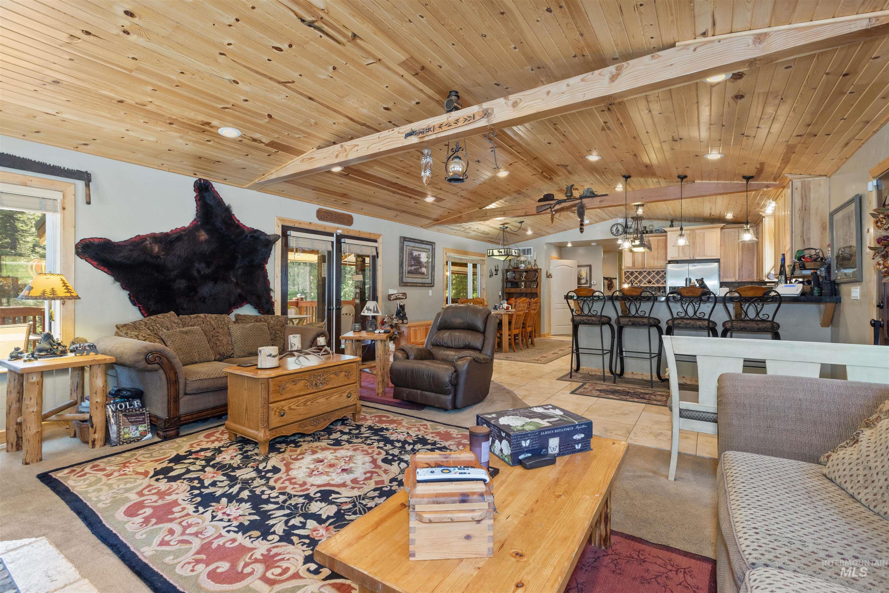 1 Miller Lane Cascade, ID 83611 - Photo 5 of 39 Tiled living room with wooden ceiling