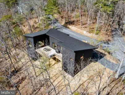 a view of a backyard of the house