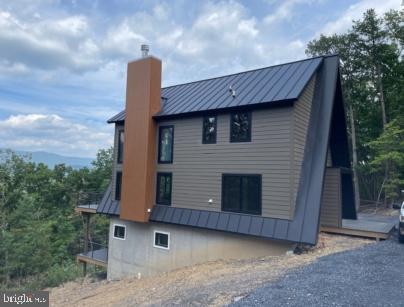 316 Sycamore Road Mount Jackson, VA 22842 - Photo 3 of 10 a front view of a house with garden