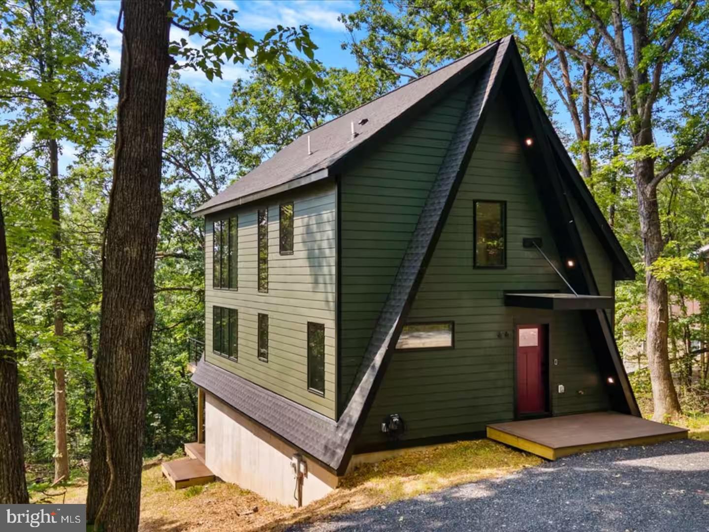 316 Sycamore Road Mount Jackson, VA 22842 - Photo 8 of 20 a view of a house with a door and wooden fence