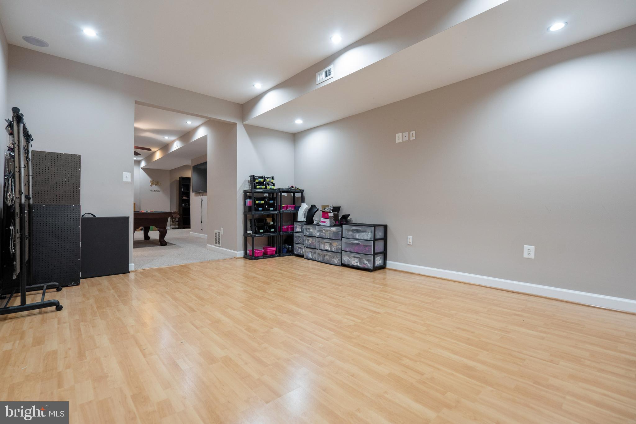 6935 Riverdale Road Lanham, MD 20706 - Photo 43 of 52 Ample Recessed Lighting in Basement