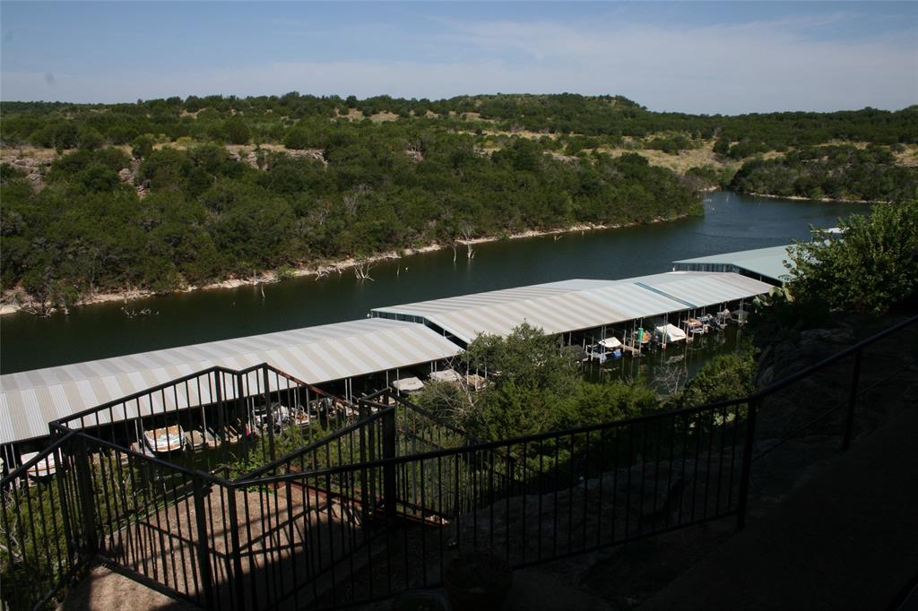 3033 Hells Gate Loop, Unit D101 Strawn, TX 76475 - Photo 3 of 22 View of Mountains and Lake