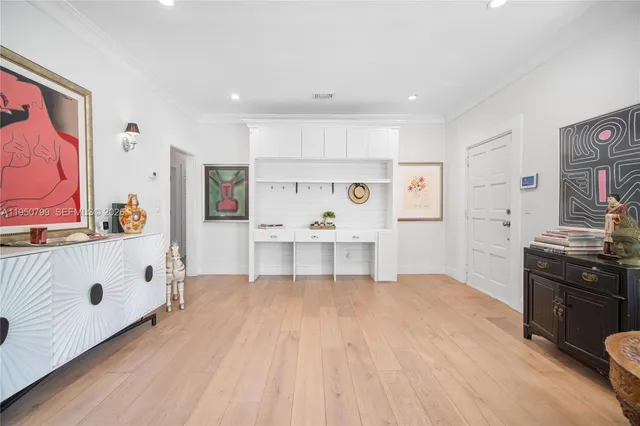 a view of kitchen with furniture and wooden floor