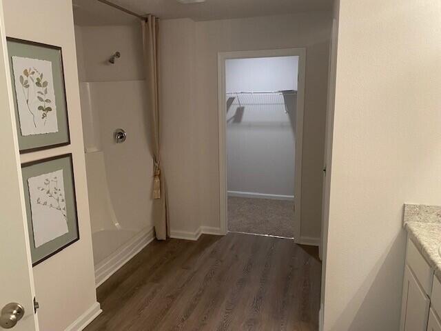 3101 Van Day Way Crestview, FL 32539 - Photo 11 of 26 a view of a hallway with wooden floor