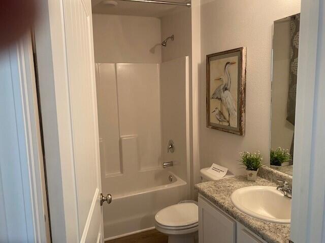 3101 Van Day Way Crestview, FL 32539 - Photo 15 of 26 a bathroom with a granite countertop toilet a sink and bathtub