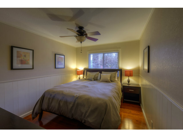 3311 Veracruz Drive San Ramon, CA 94583 - Photo 12 of 21 a bedroom with a bed and a chandelier