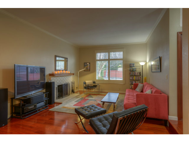 3311 Veracruz Drive San Ramon, CA 94583 - Photo 2 of 21 a living room with furniture a fireplace and a flat screen tv