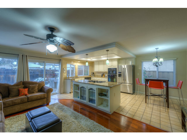 3311 Veracruz Drive San Ramon, CA 94583 - Photo 7 of 21 a living room with furniture a chandelier and a dining table